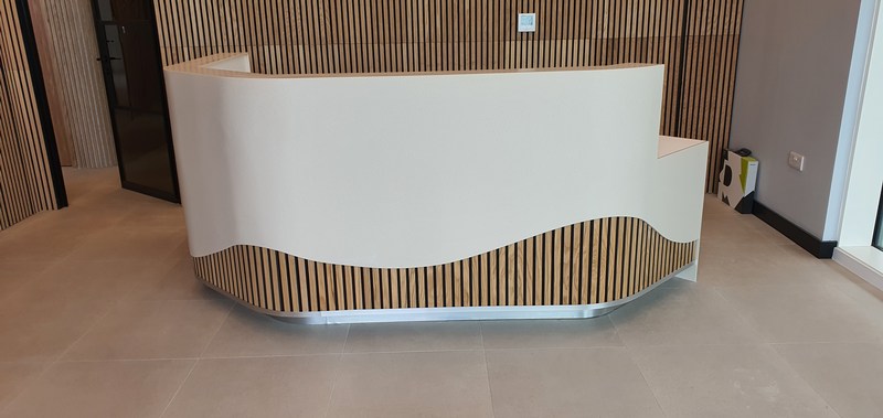 Reception desk made with a vacuum press from columbus